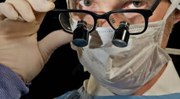 pngtree-intense-surgeon-magnify-eye-hospital-photo-image_1067011png